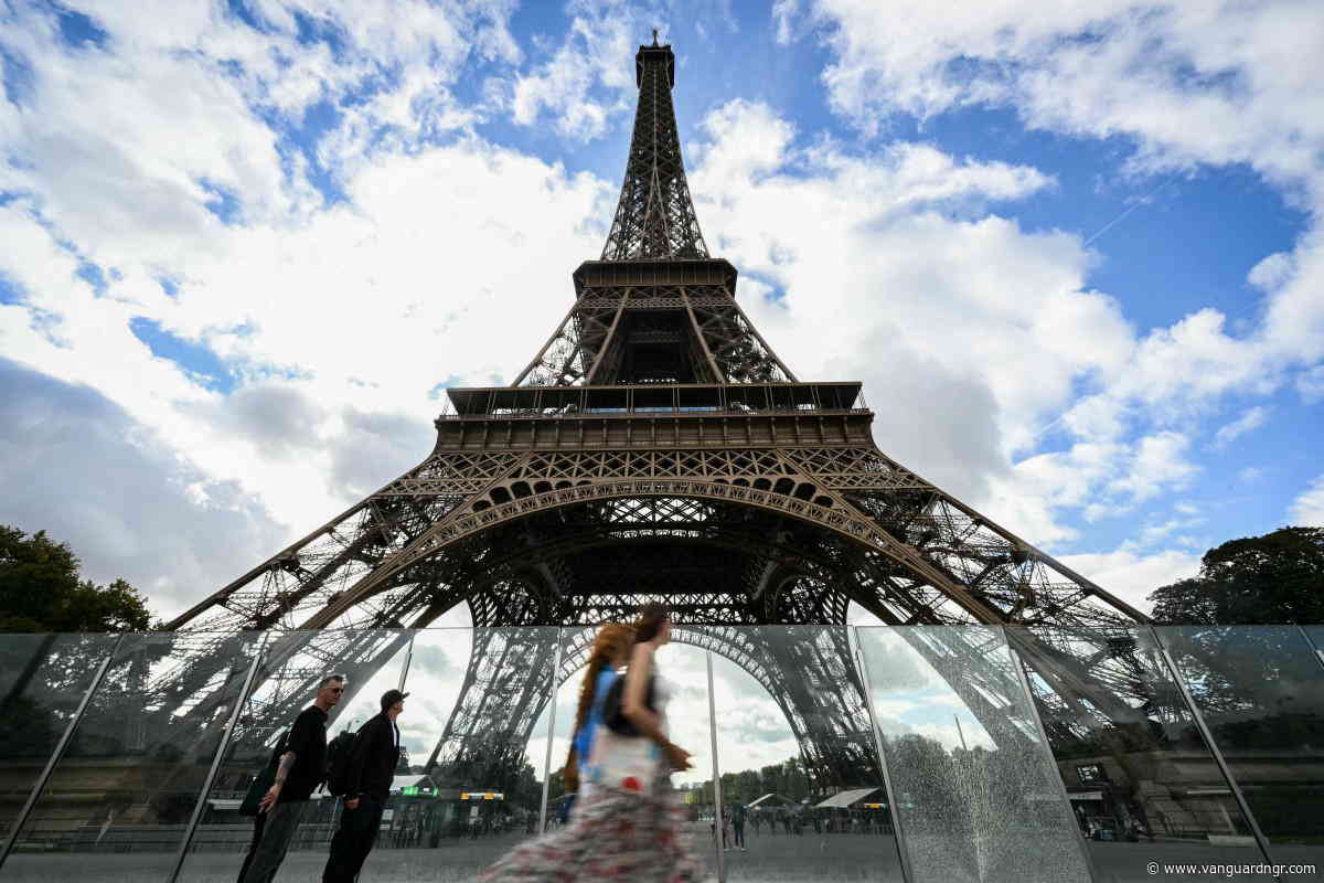 Eiffel Tower reopens after row over removing women staff