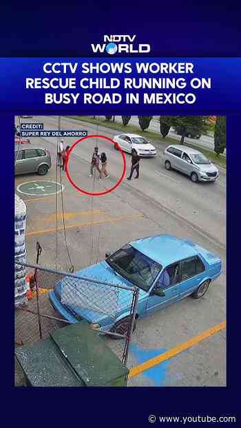 CCTV Captures Heart-Stopping Rescue As Child Runs Into Busy Road