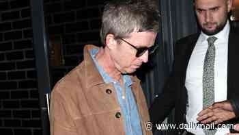 Noel Gallagher, 59, is supported by new girlfriend Nina Johnson, 28, as they party at luxury London hotel with Liam and fianceé Debbie Gwyther after Oasis doc premiere