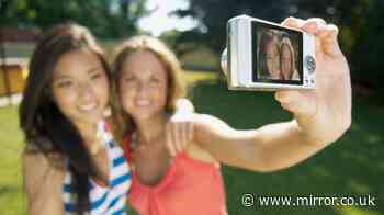 Taking pictures on a digital camera most nostalgic memory from the 2000s