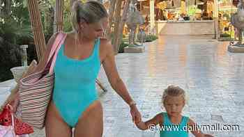 Molly-Mae Hague displays her post-baby body as she twins with daughter Bambi, 3, in matching swimsuits on a luxury five-star holiday in Turkey