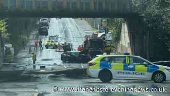 Three people including two officers hurt after police van in crash in Moston