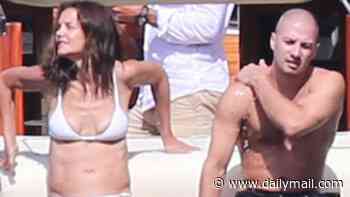 Katie Holmes, 47, shows off sculpted bikini body during PDA-filled frolic with toyboy Jason Bard Yarmosky, 39, on Lake Como