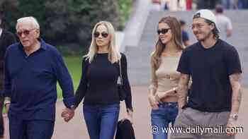 Brooklyn Beckham and Nicola Peltz put on a united front with her family as they visit D-Day's Normandy American Cemetery after Venice trip