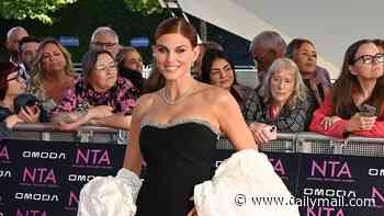 Ashley James dazzles in a breathtaking gown as she leads the stars on the red carpet at the National Television Awards