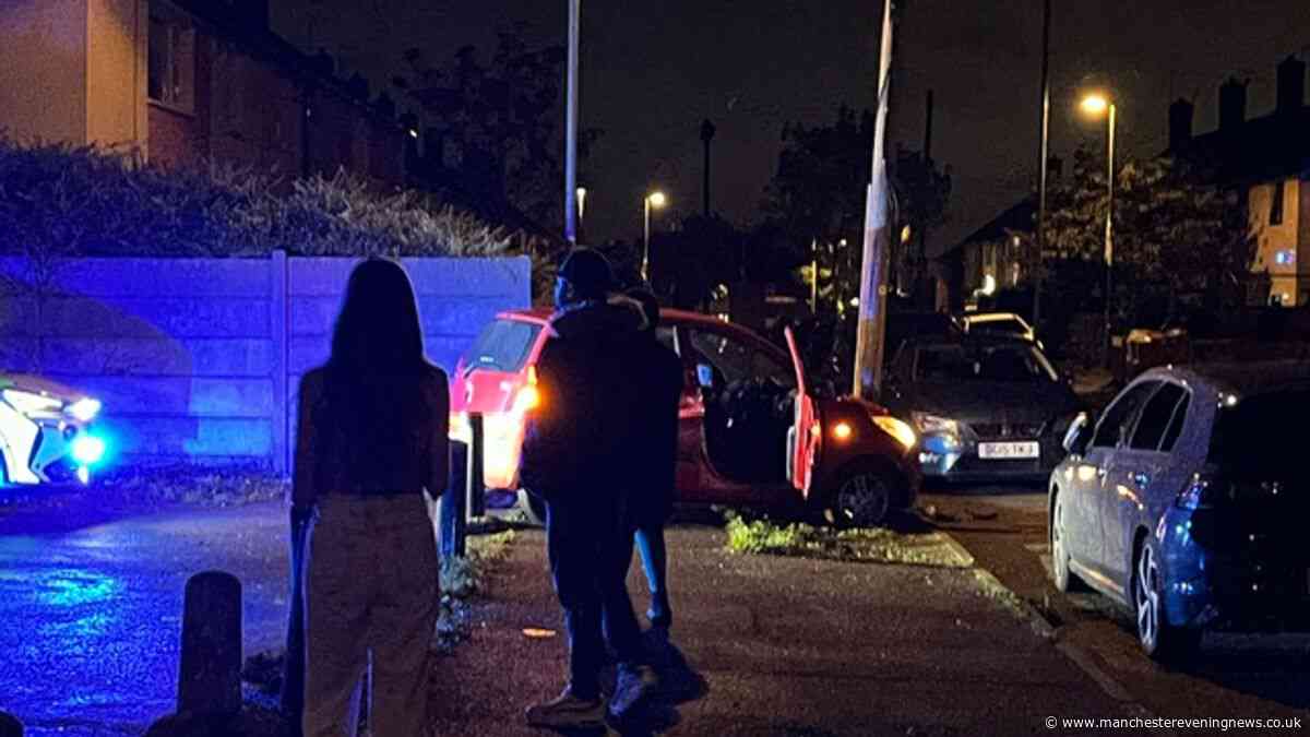 Two men arrested after police chase in Oldham ends with car 'crashing into pole'