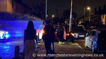 Two men arrested after police chase in Oldham ends with car 'crashing into pole'