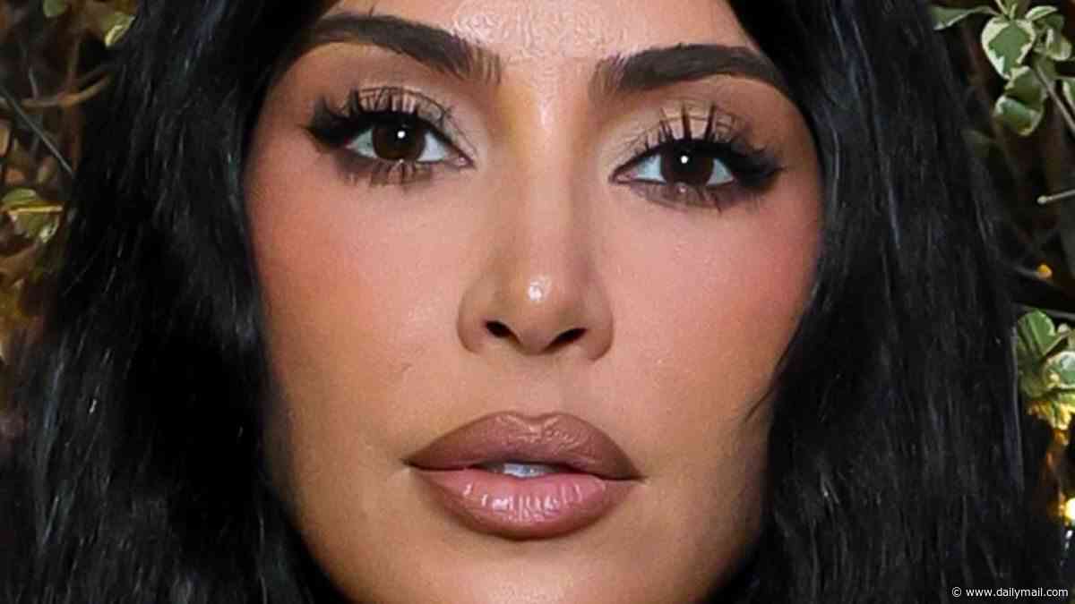 Kim Kardashian flaunts her assets as she poses in racy outfits in snaps from fitting archives