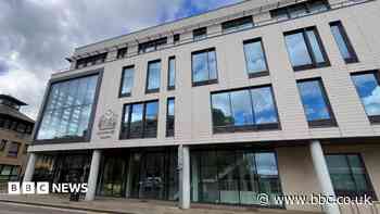 Three people in court over town centre shooting