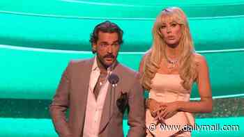Olivia Attwood and Pete Wicks trade cheeky insults on stage at the NTAs after making their red carpet debut
