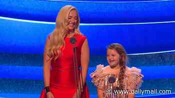 Valencia Fury, 8, makes her NTAs debut with her mother Paris as she is branded an 'icon' by viewers after becoming the star of their family show