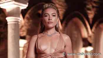 Florence Pugh commands attention in a plunging crop top and dramatic skirt as she makes a glamorous appearance at Max Mara event in Venice