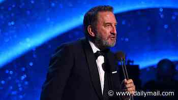 Lee Mack is supported by his three rarely-seen teen children as he accepts Quiz Show prize at the NTAs with hilarious speech