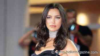 Irina Shayk shows off sculpted abs in daring lingerie look