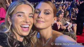 This Morning presenters Sian Welby and Ashley James' dresses get STUCK together on stage as the team accept Best Daytime award at the NTAs