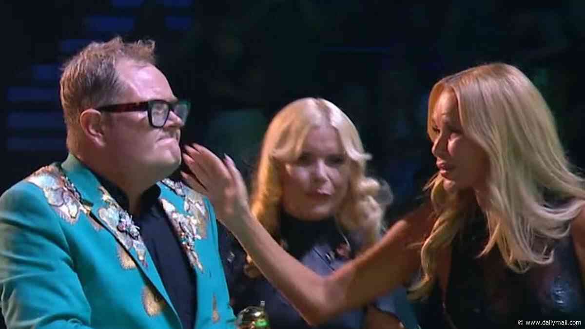 Alan Carr brands Amanda Holden a 'little b****' at the NTAs as fans go wild for Paloma Faith's theatrical on-stage 'shove' of Charlotte Church in surprise performance