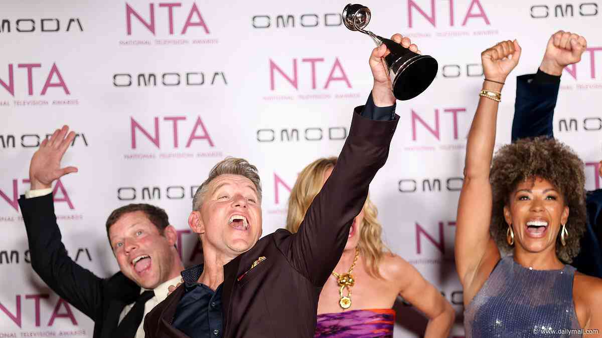 Dermot O'Leary swigs wine from the bottle as he addresses brutal ITV job cuts and dedicates NTA win to This Morning crew