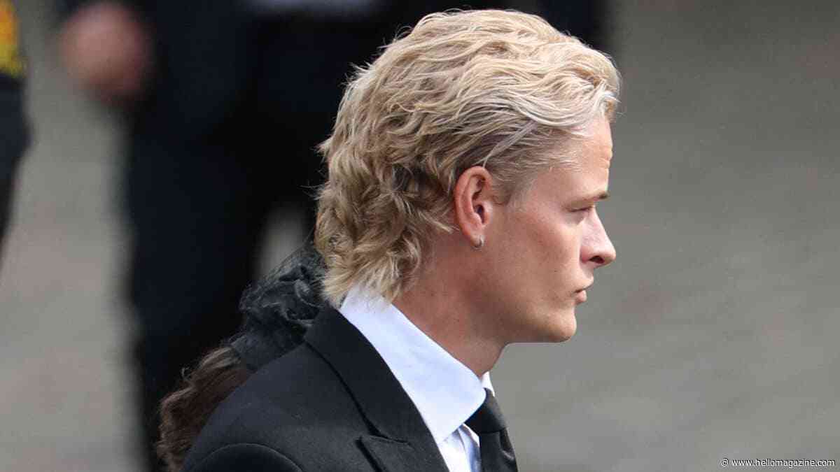 Disgraced Marius Borg Høiby makes low-key arrival at grandfather King Harald's funeral - despite house arrest