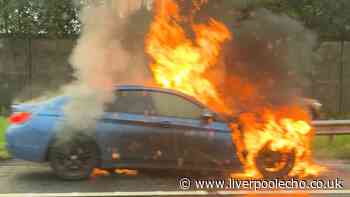 BMW bursts into flames on M62