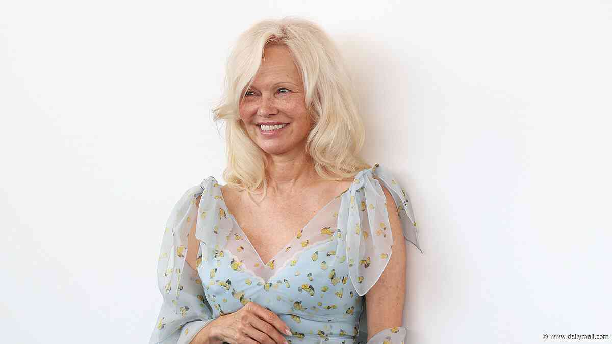 Pamela Anderson, 59, opts for voluminous locks and an elegant floral dress as she promotes new movie Place To Be at the Venice Film Festival