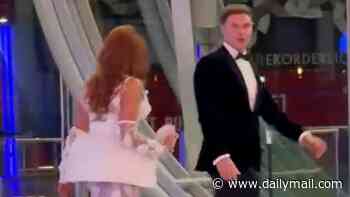 Charlotte Dawson and fiancé Matt Sarsfield engage in a tense discussion as he walks away from her in heated moment after the NTAs - nine months on from their split