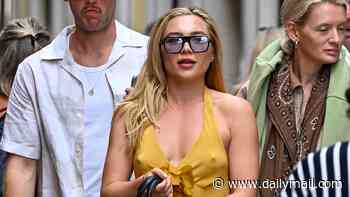 Florence Pugh looks chic in a yellow Rodarte dress as she fits in a shopping trip to Prada during a break at the Venice Film Festival