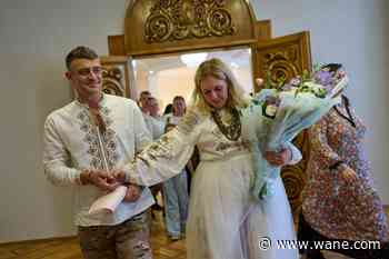 Hours after a Russian attack destroys their home, a Ukrainian couple marries anyway