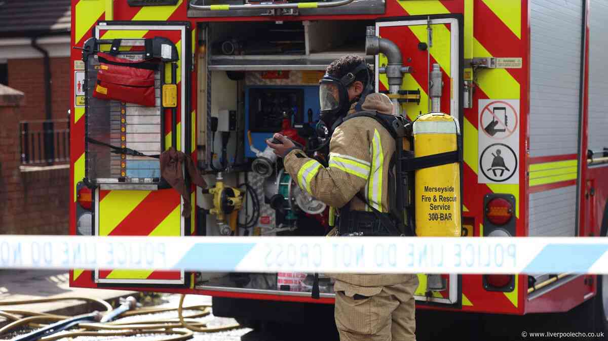 'Huge bang' heard on Toxteth street as black smoke pours from flat