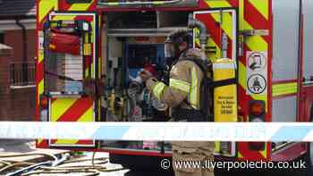 'Huge bang' heard on Toxteth street as black smoke pours from flat