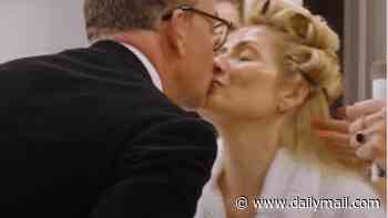 Holly Willoughby shares a sweet kiss with her husband Dan Baldwin in a rare PDA moment as she gets glammed up for the NTAs