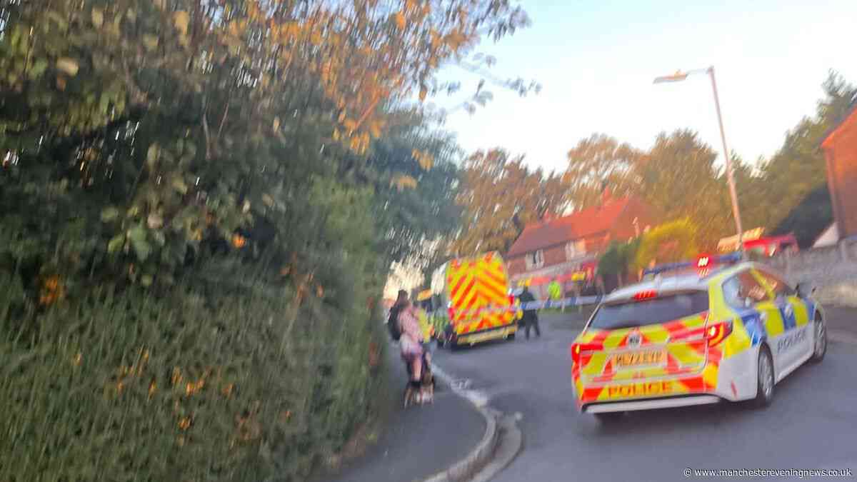 Man taken to hospital after being rescued from fire at flat in Bolton