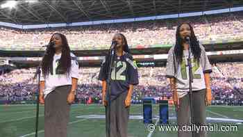 NFL fans divided over Black National Anthem before season opener in Seattle... as crowd goes wild for 'beautiful' performance