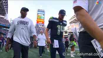 Disaster for Super Bowl champion Seahawks as QB Sam Darnold limps off just minutes into NFL season