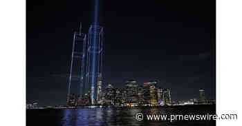 2,977 LIGHTS RISE OVER NEW YORK HARBOR AND REBUILD THE TWIN TOWERS IN LIGHT