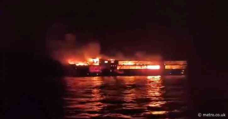 At least five dead and 86 missing after passenger ferry fire