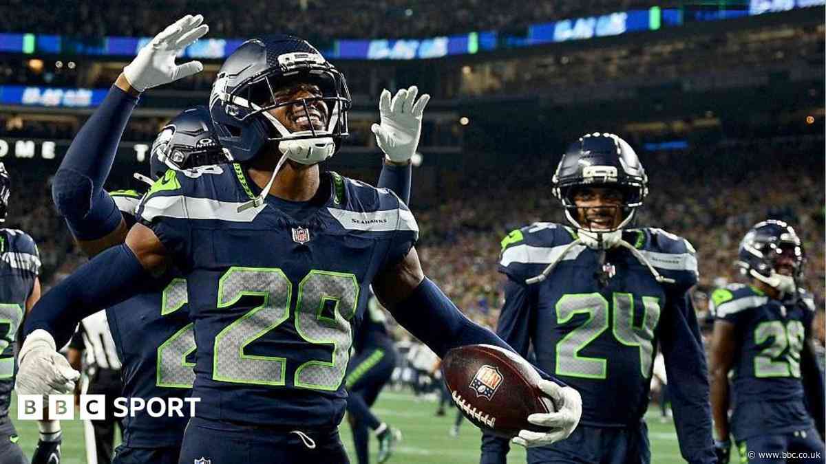 Champions Seahawks fight back to win season opener