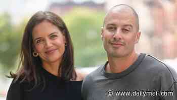 Katie Holmes, 47, and boyfriend Jason Bard Yarmosky, 38, pack on the PDA at NYFW