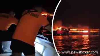 Reddingswerkers in actie na dodelijke brand op Filipijnse veerboot