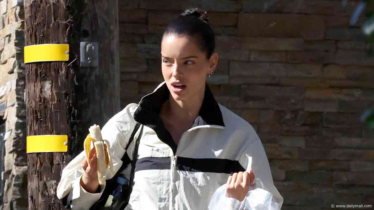 Maura Higgins tucks into a banana as she heads to Dancing With The Stars rehearsals wearing hotpants amid 'fix' claims