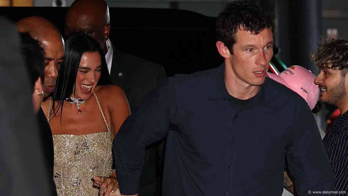 Dua Lipa and Callum Turner hold hands as they enjoy a New York date night at star-studded Bvlgari event