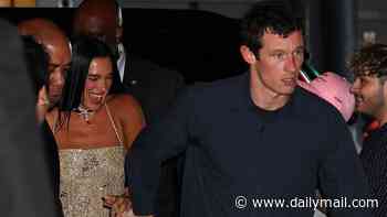 Dua Lipa and Callum Turner hold hands as they enjoy a New York date night at star-studded Bvlgari event
