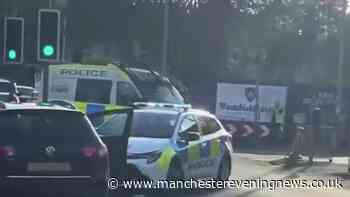 Two men rushed to hospital after being injured by Salford 'hit-and-run driver'