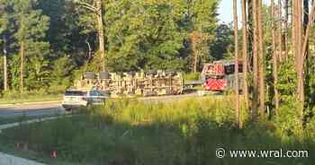 Mixer truck flips near Holly Springs neighborhood