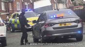Armed police storm Rochdale after man seen 'driving with gun'