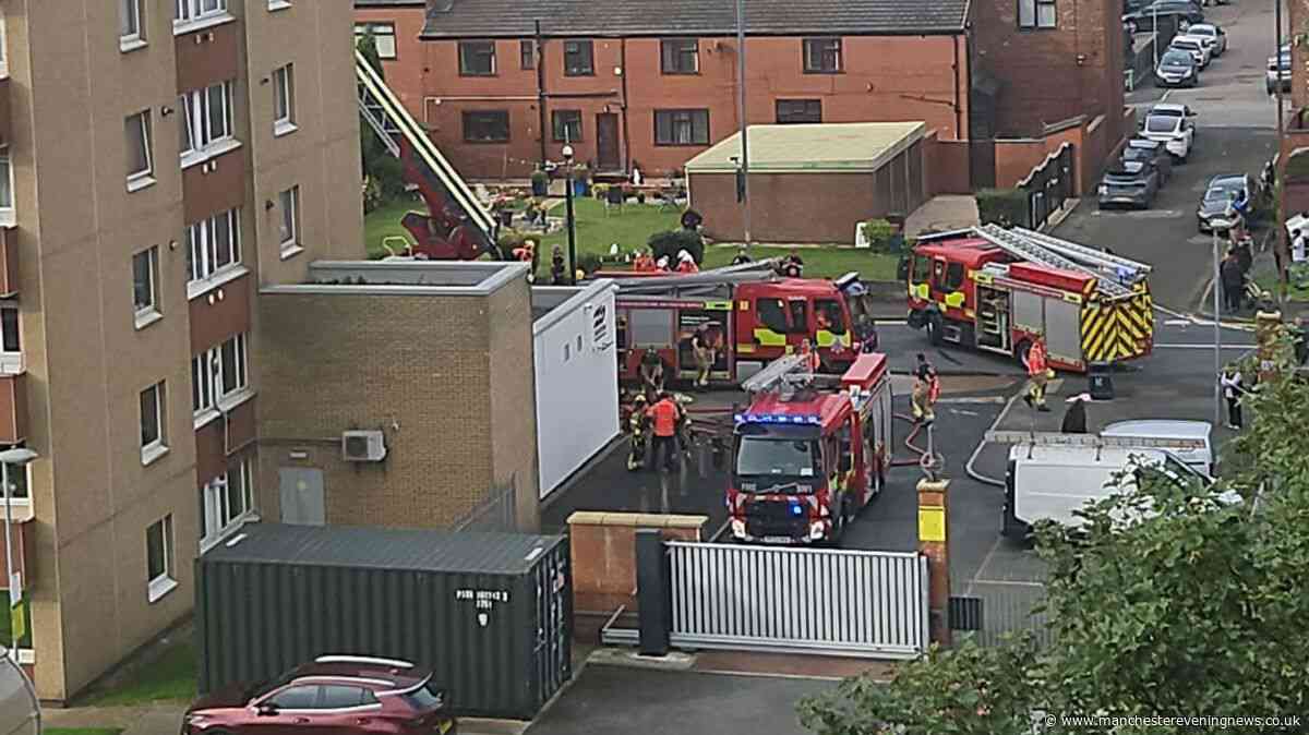 Ashton tower block kitchen fire sparks huge emergency services response