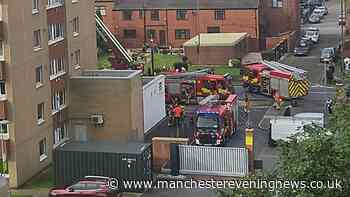 Ashton tower block kitchen fire sparks huge emergency services response