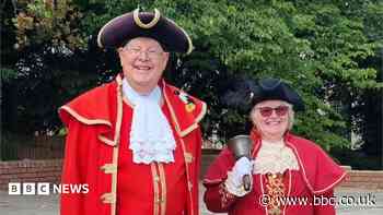 Oyez! Town crier passes bell on after 23 years