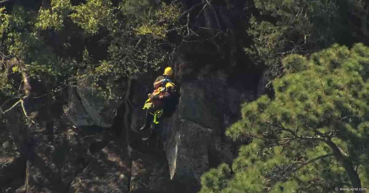 Crews rescue man from rocks along Haw River