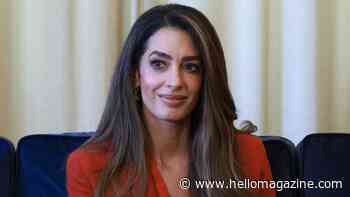 Amal Clooney sizzles in red-hot silk and skyscraper heels