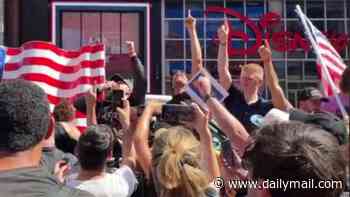 Charlie Kirk statue unveiling in Times Square descends into chaos as protesters clash on anniversary of his death